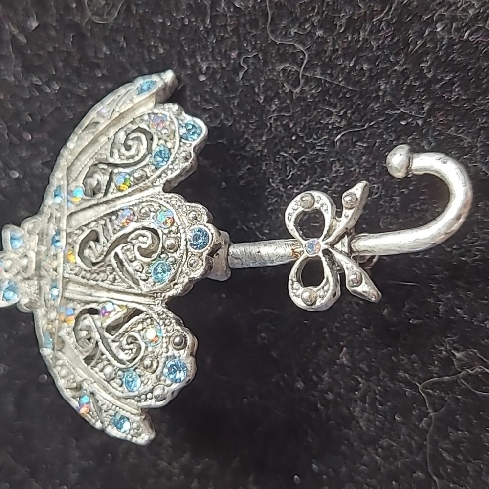 1928 Elegant Silver and Blue Umbrella Brooch